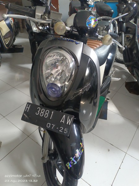 Motor scoopy